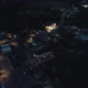 Drone Flying Over Small Town at Night - VideoHive Item for Sale