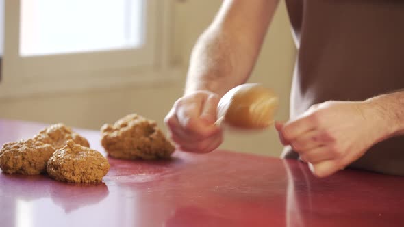 Man making vegan meat. Process, how to cook seitan