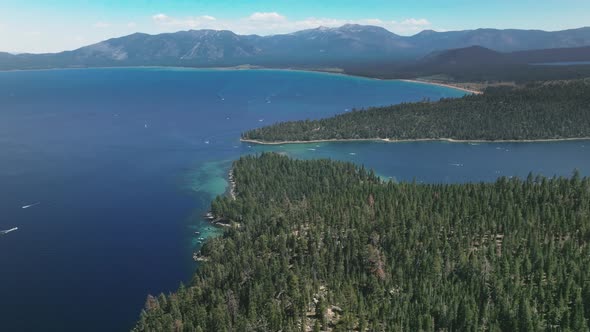 Lake Tahoe Searching Over Clear Blue Turquoise Water And Rocky Shoreline