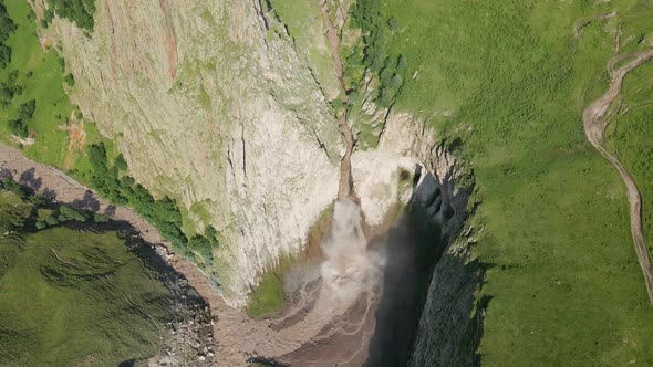 Dirty Waterfall Sultan High in the Mountains Near Elbrus in Summer