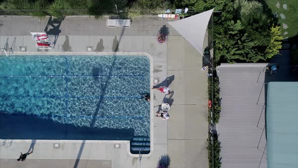 Top View of People Relaxing by the Pool in Westhampton New York