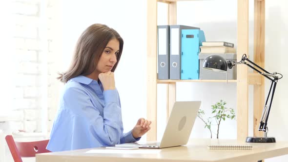 Pensive Woman Working on Laptop, Thinking and Planning