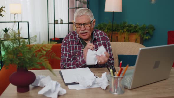 Grandfather Working on Laptop Man Writing on Paper Sheet Getting Angry Crumpling It Throwing Away