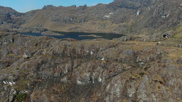 4k aerial drone footage over the 4th lagoon of Pichgacocha from Ambo, Huanuco, Peru in the Andes mou