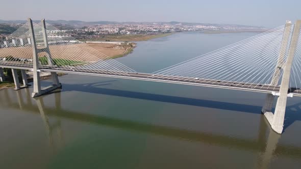 Flying over the longest bridge in Europe - Vasco da Gama in Lisbon, Portugal