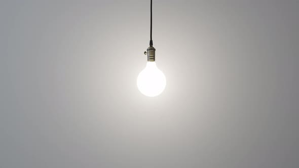 An Energysaving Light Bulb Illuminates the Room