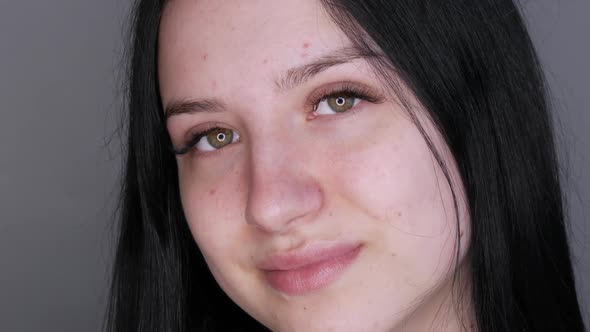 Young Beautiful Woman Model Posing in Front of the Camera