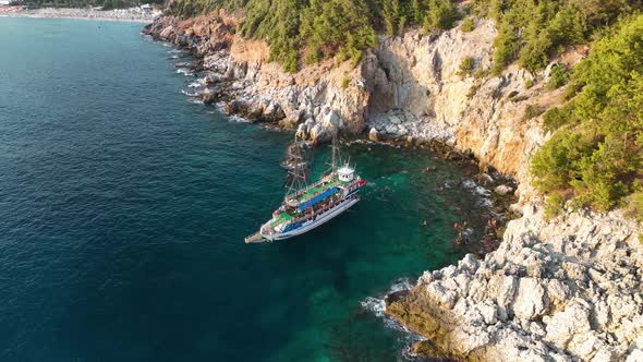 A large yacht stands at sea aerial view 4 K Turkey Alanya