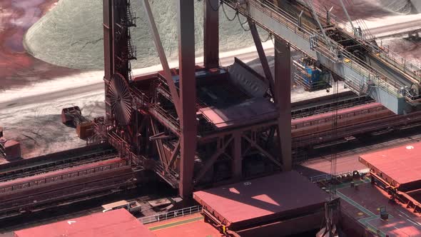 Cranes Unloading Cargo from a Bulk Carrier Ship at Port