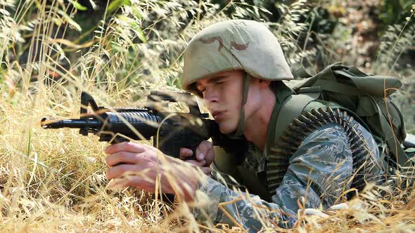 Military soldier during training exercise with weapon