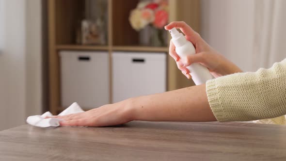 Close Up of Woman Cleaning Table at Home