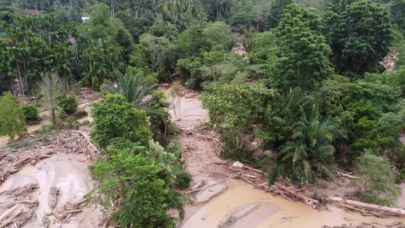 Serious flash flood with debris and mud destroy the rural area