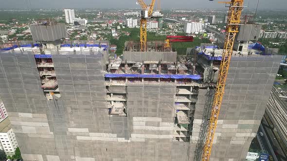 Aerial view of modern high rise building under construction in the busy city centre business distric