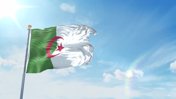 Flag of Algeria waving on blue sky background