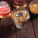 Closeup of Various Fruit Desserts with Chia Seeds Nuts and Berries on a Table - VideoHive Item for Sale