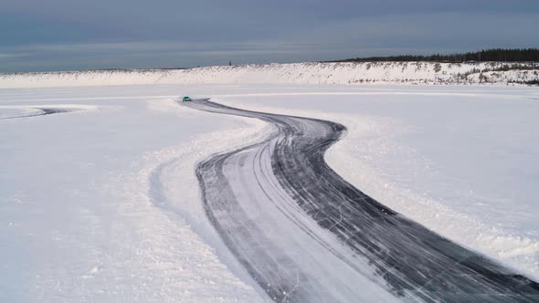 Aerial view of a racing car at an ice rally