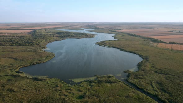 Aerial fly above beautiful lake