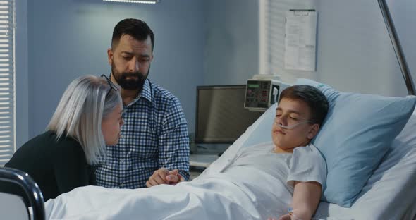 Teenager Boy Lying in Hospital