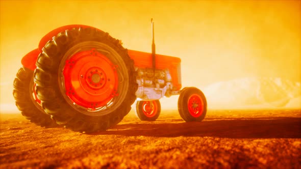 Vintage Retro Tractor on a Farm in Desert