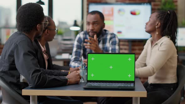 Team of African American People Having Laptop with Green Screen