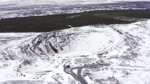 Snowy Volcanic Kerid Crater on the Golden Circle of Iceland Seen From the Air