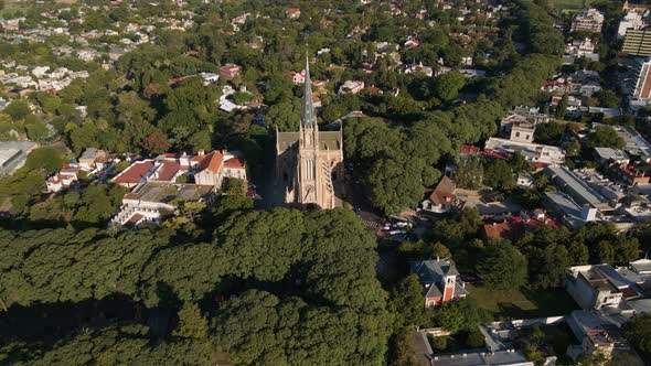 Aerial of San Isidro Cathedral and revealing La Plata river and Buenos Aires city on background