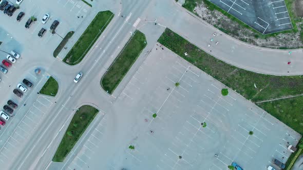 Top View of the Road with Cars and Parking Spaces