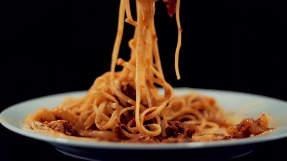 Man Eat Pasta Italian With Sauce Bolognese. Spaghetti,Tomato And Parmesan. Italian Carbonara Cuisine