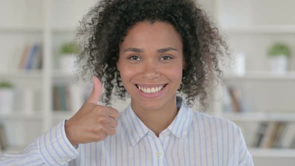 Positive African Woman Doing Thumbs Up