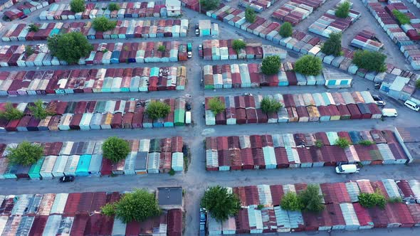 Flying a Drone Over a Plethora of Multicolored Metal Storage Containers