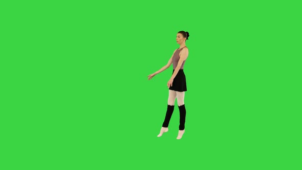 Young Ballerina in Training Clothes Appears Makes Some Basic Movements and Runs Away on a Green