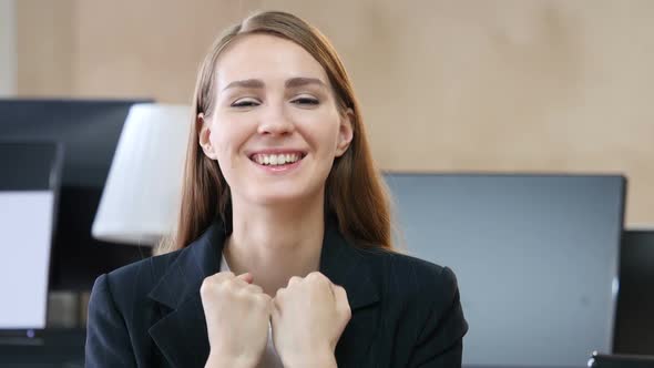 Happy Excited Woman in Office