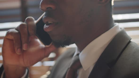 Close Up of Afro-American Businessman Talking on Phone