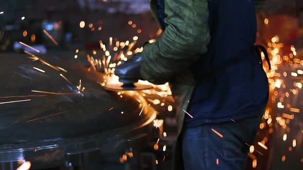 Worker polishing in metal industry detail plane