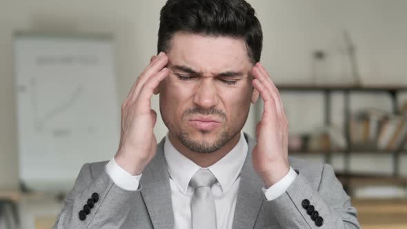 Headache Stressed Businessman with Pain in Head