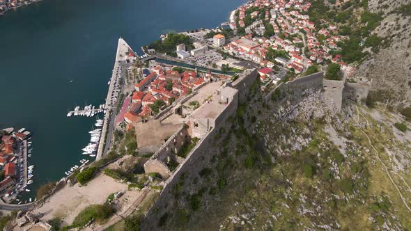 Aerial Shot of the Fortress St John San Giovanni Over the Old Town of Kotor the Famous Tourist Spot