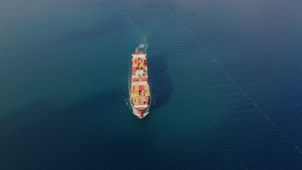 Aerial Drone Front Top View Video of Ship Sailing to Port