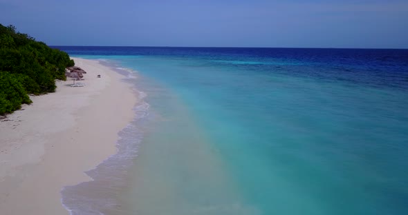 Luxury drone abstract shot of a summer white paradise sand beach and blue ocean background 