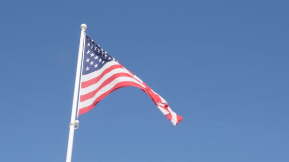 United States of America flag on the wind waving 4K 2160p ultraHD footage - American flag against bl