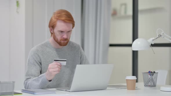 Successful Online Shopping By Beard Redhead Man on Laptop