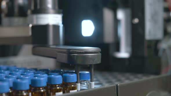 Auto Sampler Takes a Vial and Injects a Sample Into High Performance Liquid Chromatography. 