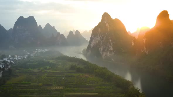 Aerial shot of the amazing rock formations along the Li River in China