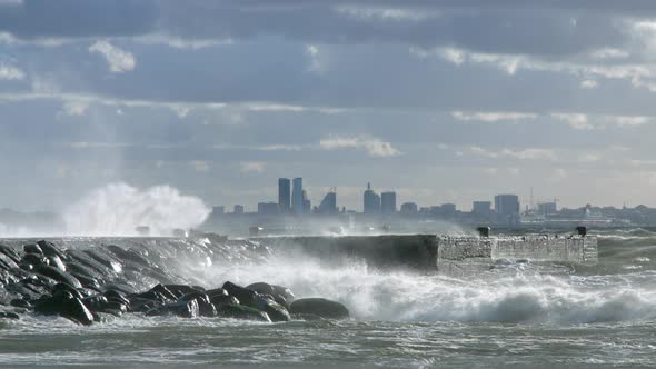 Big Waves Crashing To Pier City Backgound