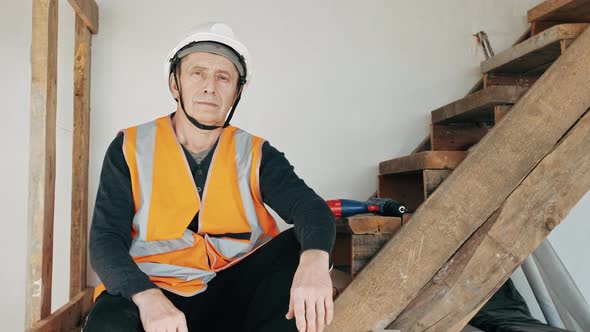 Portrait of mature man constructor. Designer worker. Renovation concept. Building new house or apart