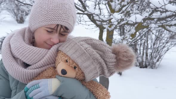 Girl with best toy in winter.