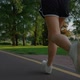 Young Fitness Sport Woman Running on Road at Sunset - VideoHive Item for Sale
