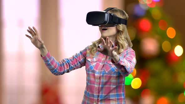 Pretty Girl Wearing Virtual Reality Goggles.