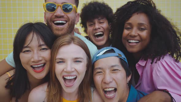 Group of friends having fun on the beach.