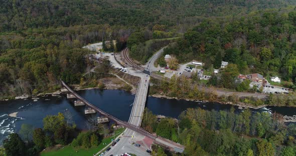 A high forward view of the small town of Ohiopyle, Pennsylvania in early autumn. The Youghiogheny Ri