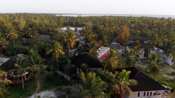 Paradise Coast Resort with Palm Trees and Hotels By Ocean Zanzibar Aerial View